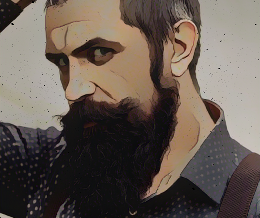 A man with a well groomed beard from using natural beard oil Australia.