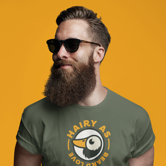 Hairy As Beard Love Green organic cotton T-Shirt with Roundel Logo using orange text. Worn by a young man with a beautiful big beard.